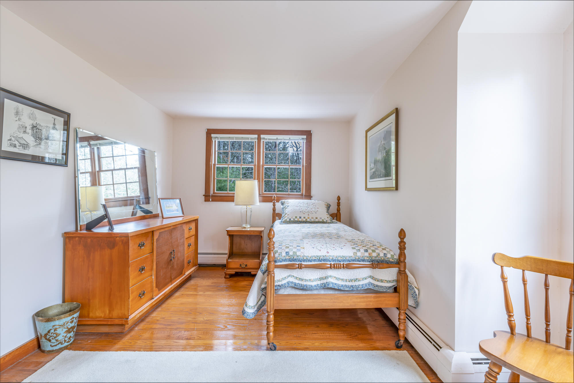 138 Namequoit Road Orleans, MA 02653 - Photo 18 of 50 a bedroom with furniture and a wooden floor