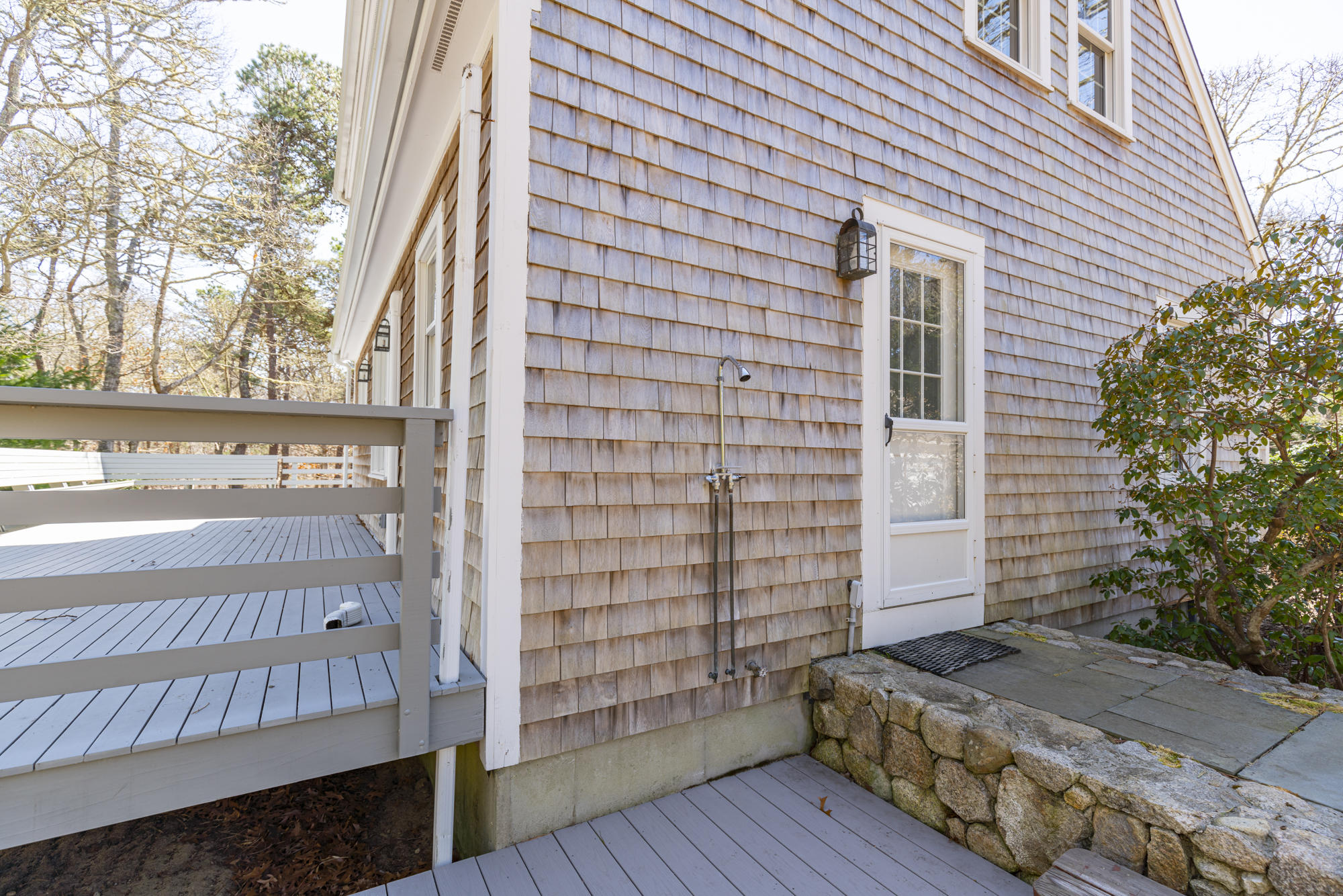 138 Namequoit Road Orleans, MA 02653 - Photo 28 of 50 a view of a balcony with wooden floor and fence
