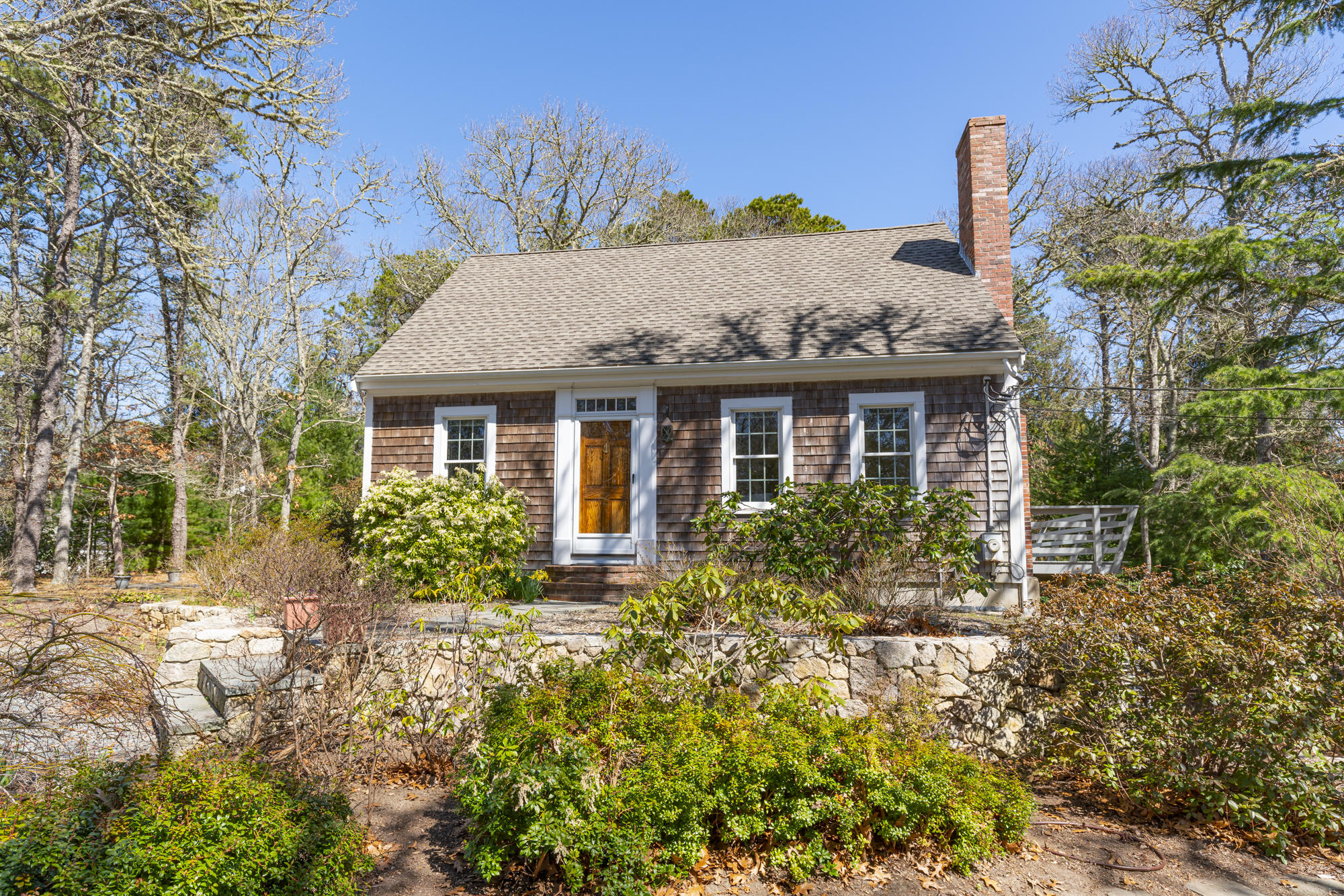 138 Namequoit Road Orleans, MA 02653 - Photo 33 of 50 a front view of house with yard and seating space