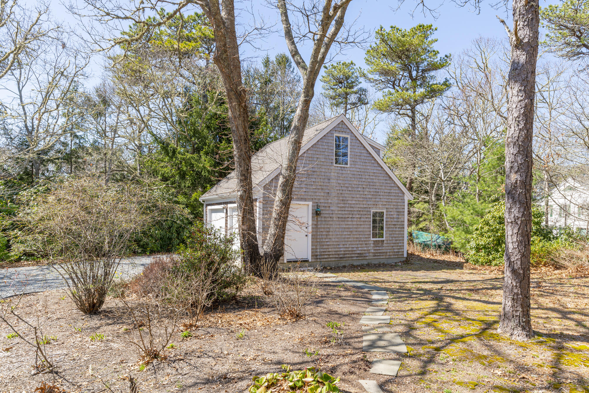 138 Namequoit Road Orleans, MA 02653 - Photo 35 of 50 a view of a house with a yard
