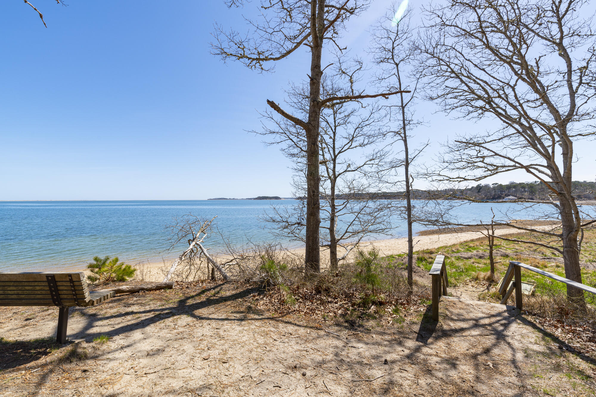 138 Namequoit Road Orleans, MA 02653 - Photo 39 of 50 a view of a lake with a beach