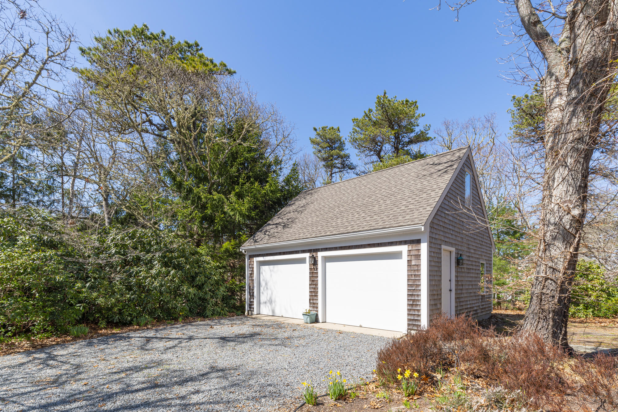 138 Namequoit Road Orleans, MA 02653 - Photo 4 of 50 a house with a yard