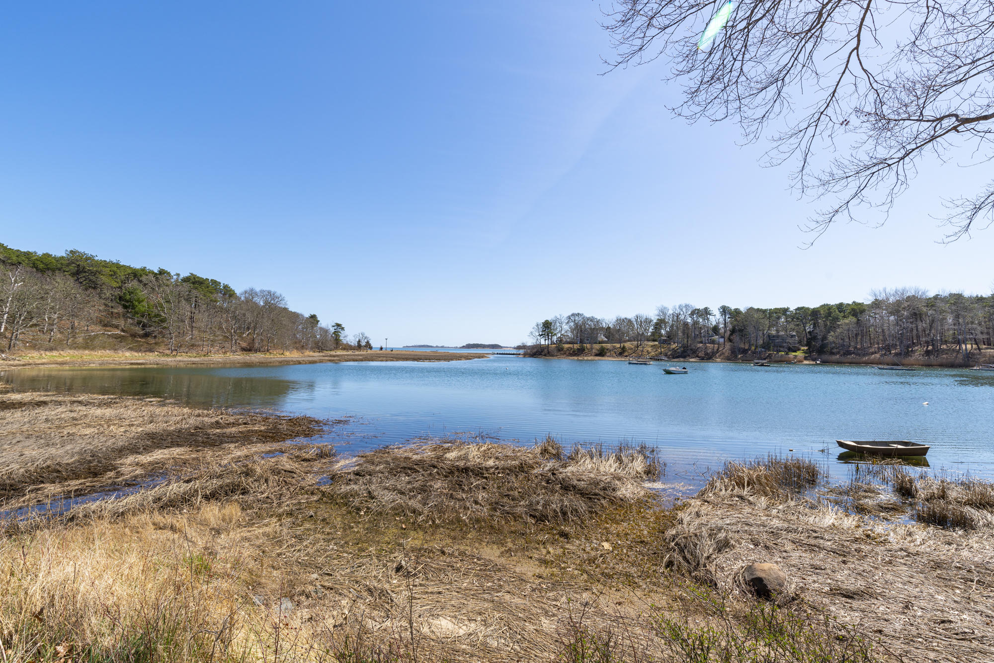 138 Namequoit Road Orleans, MA 02653 - Photo 45 of 50 a view of a lake with houses in the back
