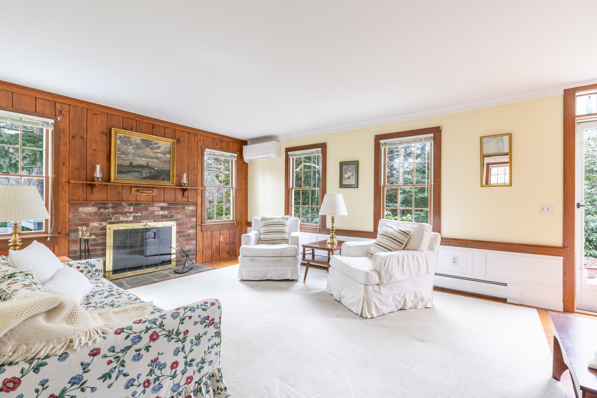 138 Namequoit Road Orleans, MA 02653 - Photo 7 of 50 a bedroom with furniture and a fireplace