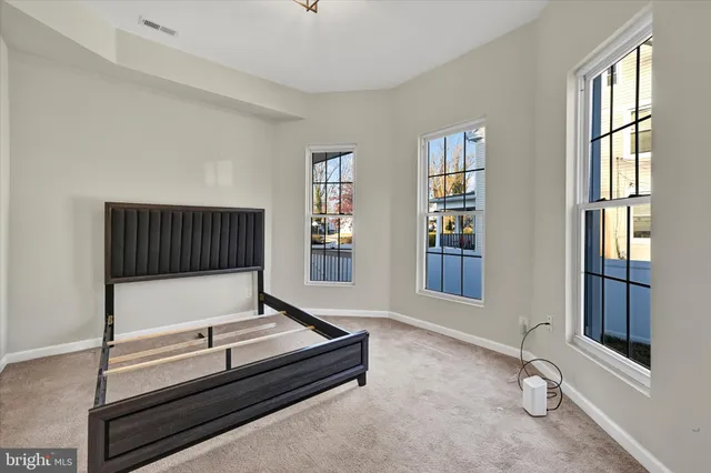 a bathroom with a sink vanity tub and a mirror