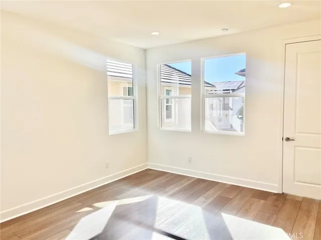 a bathroom with a shower a sink and a mirror