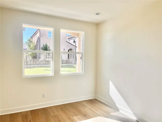a view of a room that has a window in it