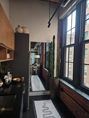 a kitchen with a stove and a microwave