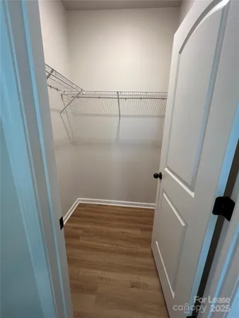 a view of small space with racks on the wall