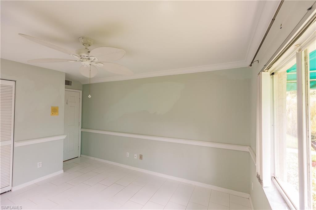 121 Gabriel Circle, Unit 1111 Naples, FL 34104 - Photo 13 of 34 a bathroom with a bathtub and a shower