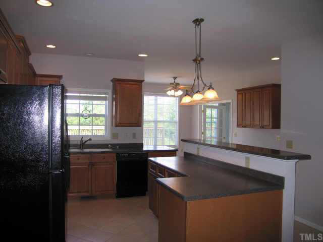 14932 New Light Road Wake Forest, NC 27587 - Photo 3 of 6 Bright open kitchen with solid surface counters Other