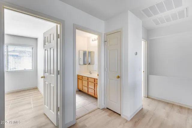 a view of a bathroom with a shower and a sink