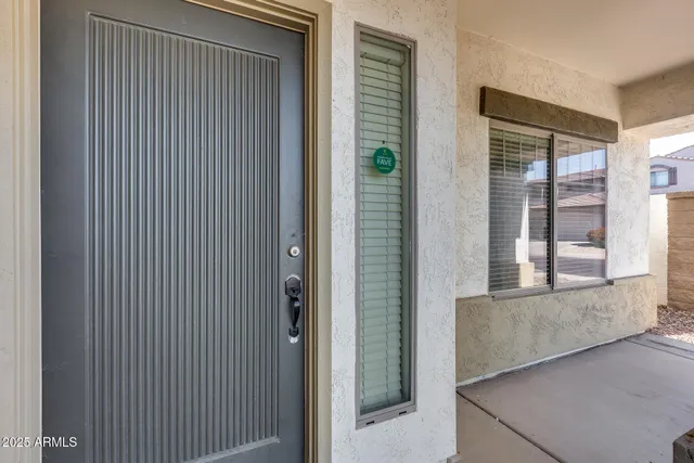 a view of an empty room with a fireplace