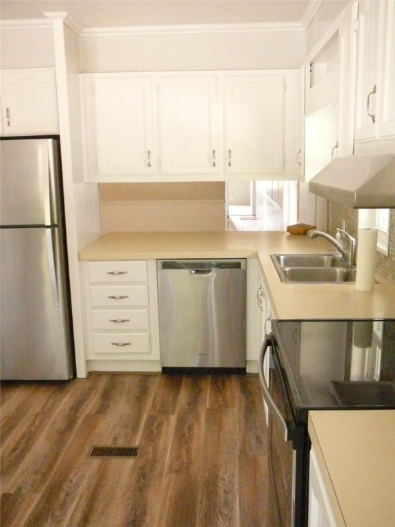 42 Lane F Coventry, RI 02816 - Photo 8 of 16 Kitchen counter opens to Dining Room for easy serving or bar seating.