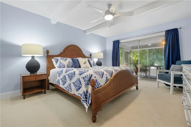 a bathroom with a granite countertop sink a mirror and shower