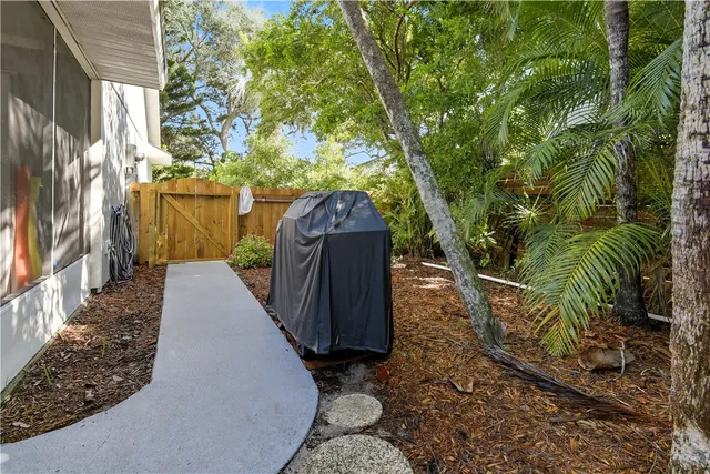 a view of a swimming pool in a backyard