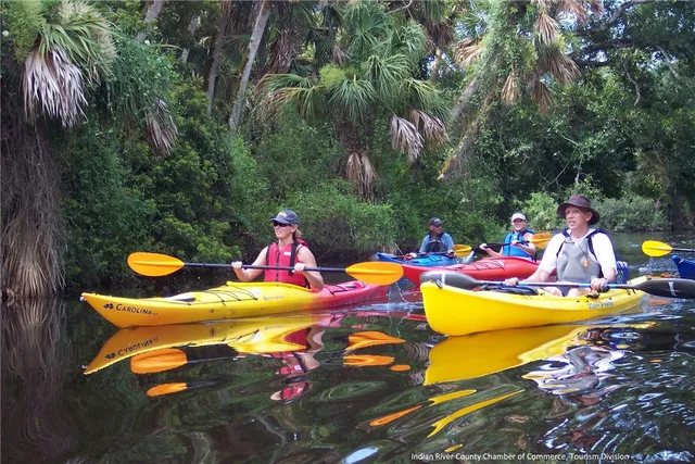 an outdoor space with patio tables and chairs