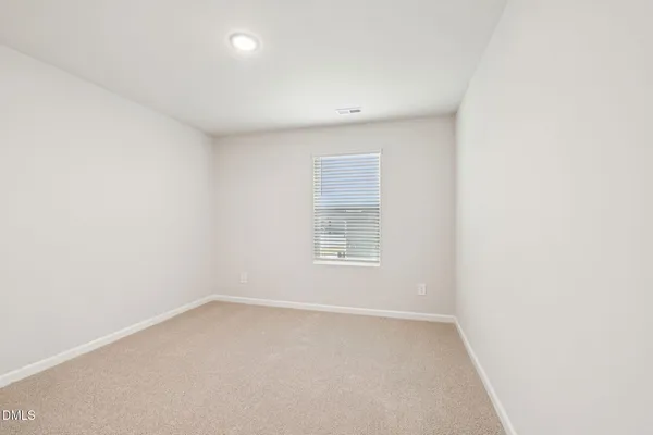 a bathroom with a sink double vanity and a mirror