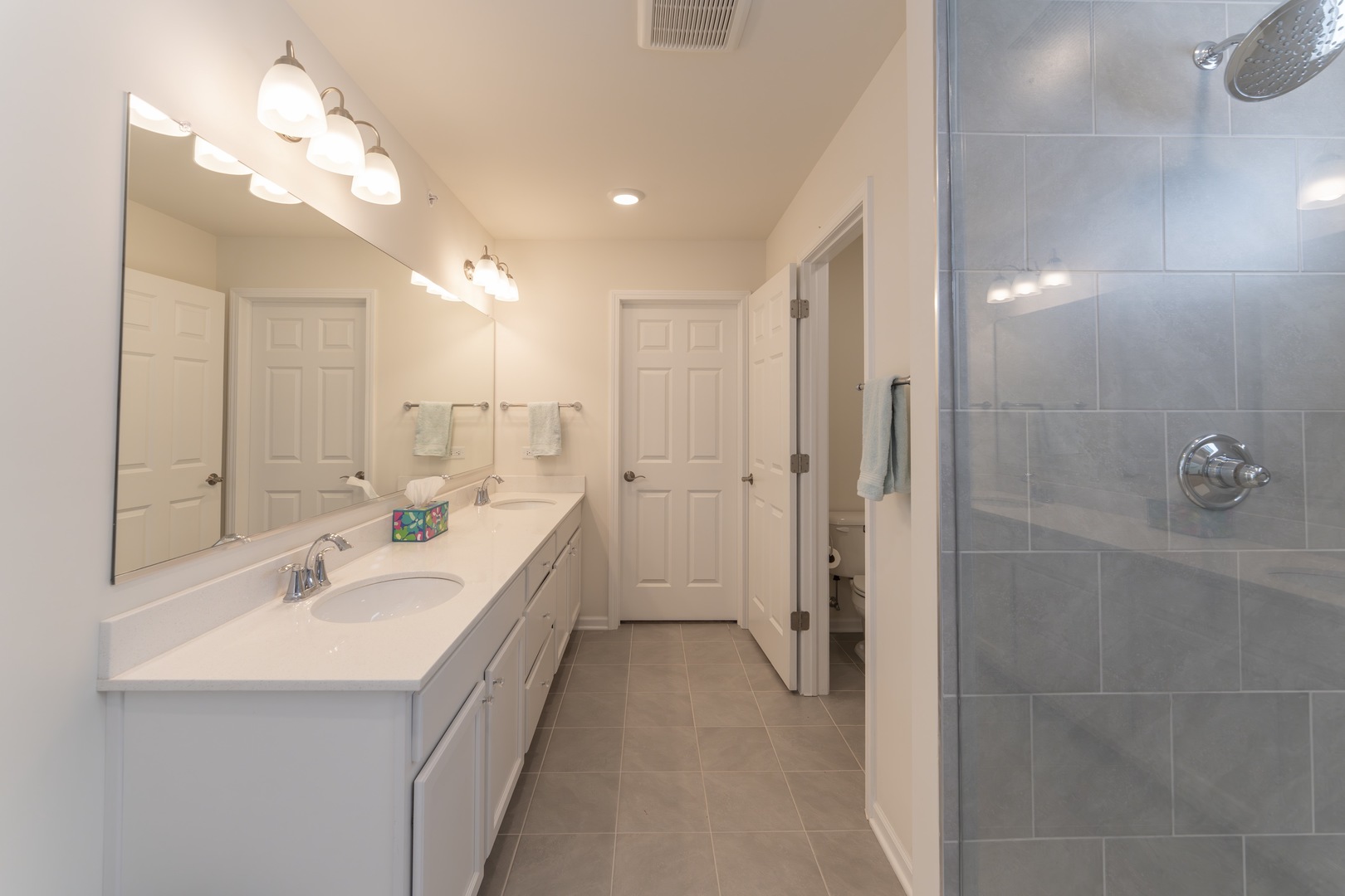 3316 Trillium Circle Rolling Meadows, IL 60008 - Photo 20 of 27 a bathroom with a double vanity sink mirror and shower