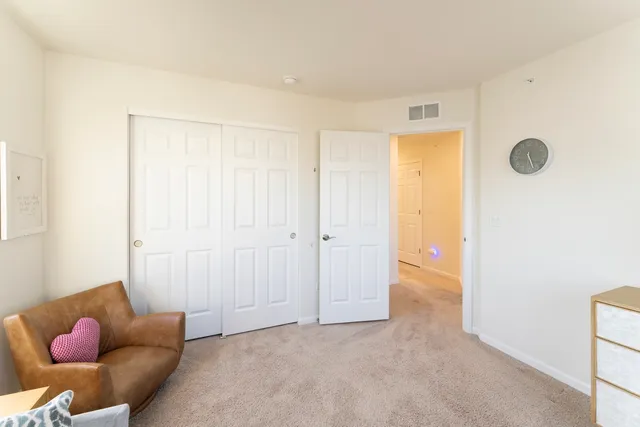 a view of livingroom with furniture and cabinet