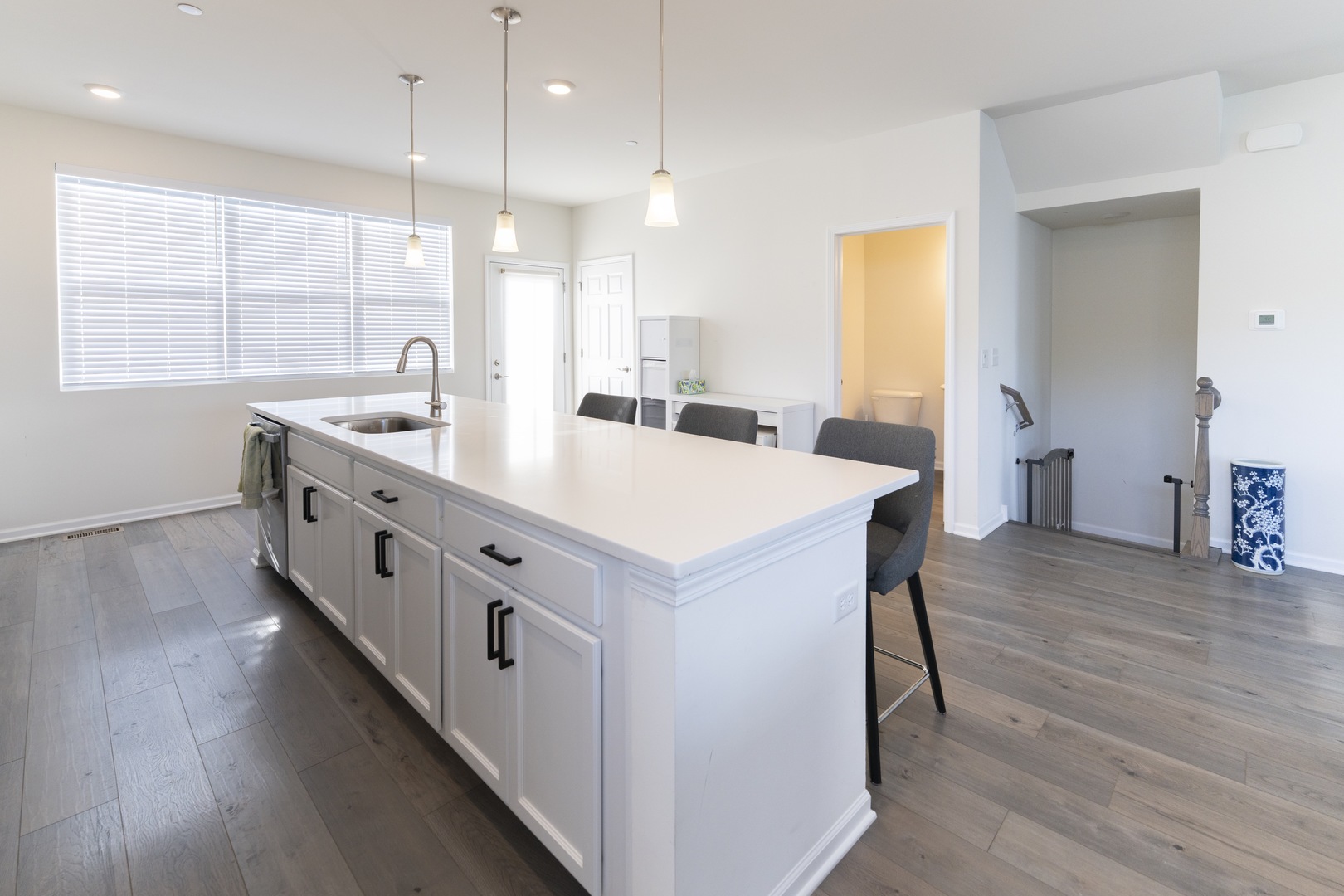 3316 Trillium Circle Rolling Meadows, IL 60008 - Photo 9 of 27 a large white kitchen with a large island
