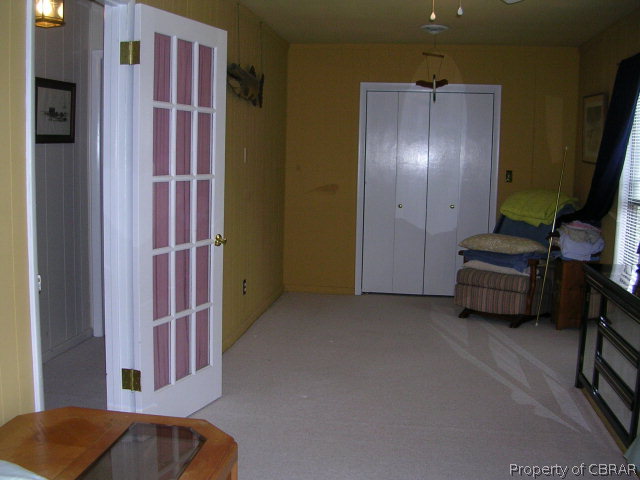 301 Beaumar Road Moon, VA 23119 - Photo 19 of 25 a view of a livingroom with furniture and a flat screen tv