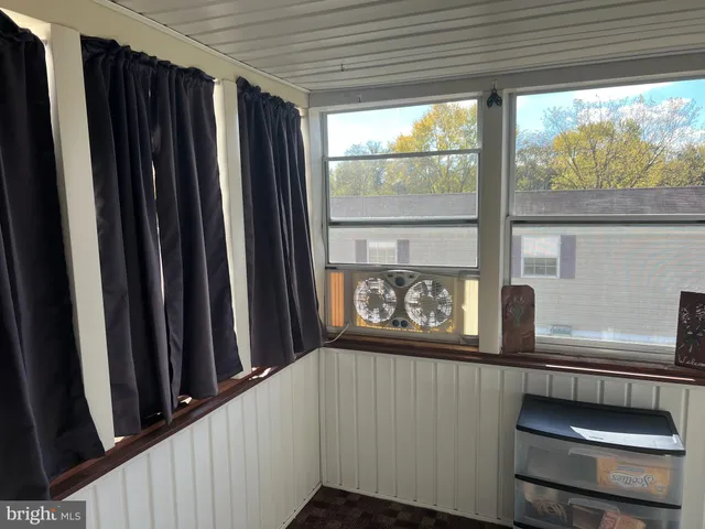 a view of a balcony with an outdoor space