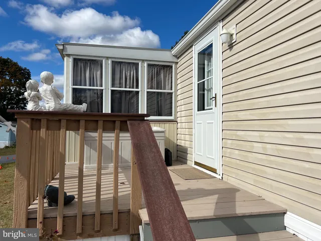 a view of a house with a large window