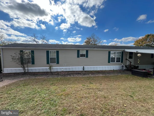 a view of a house with a patio