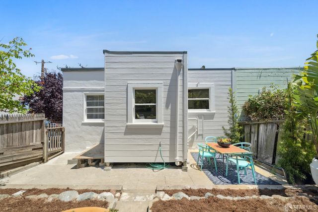 a view of a house with a patio