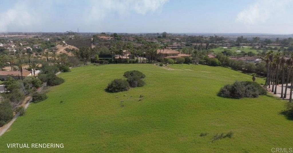 0 Sypglass Lane Rancho Santa Fe, CA 92067 - Photo 17 of 22 a view of a grassy area with mountains and a houses