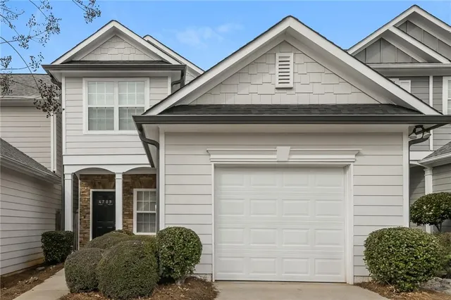 a view of a house with garage