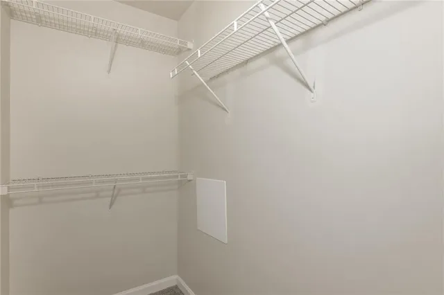 a view of a room with racks on the wall