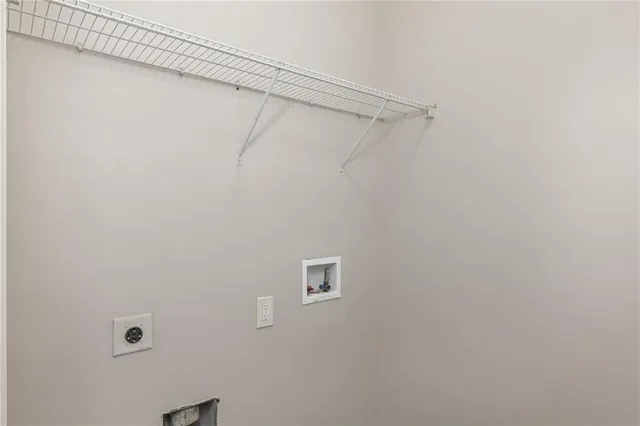 a view of a room with racks on the wall