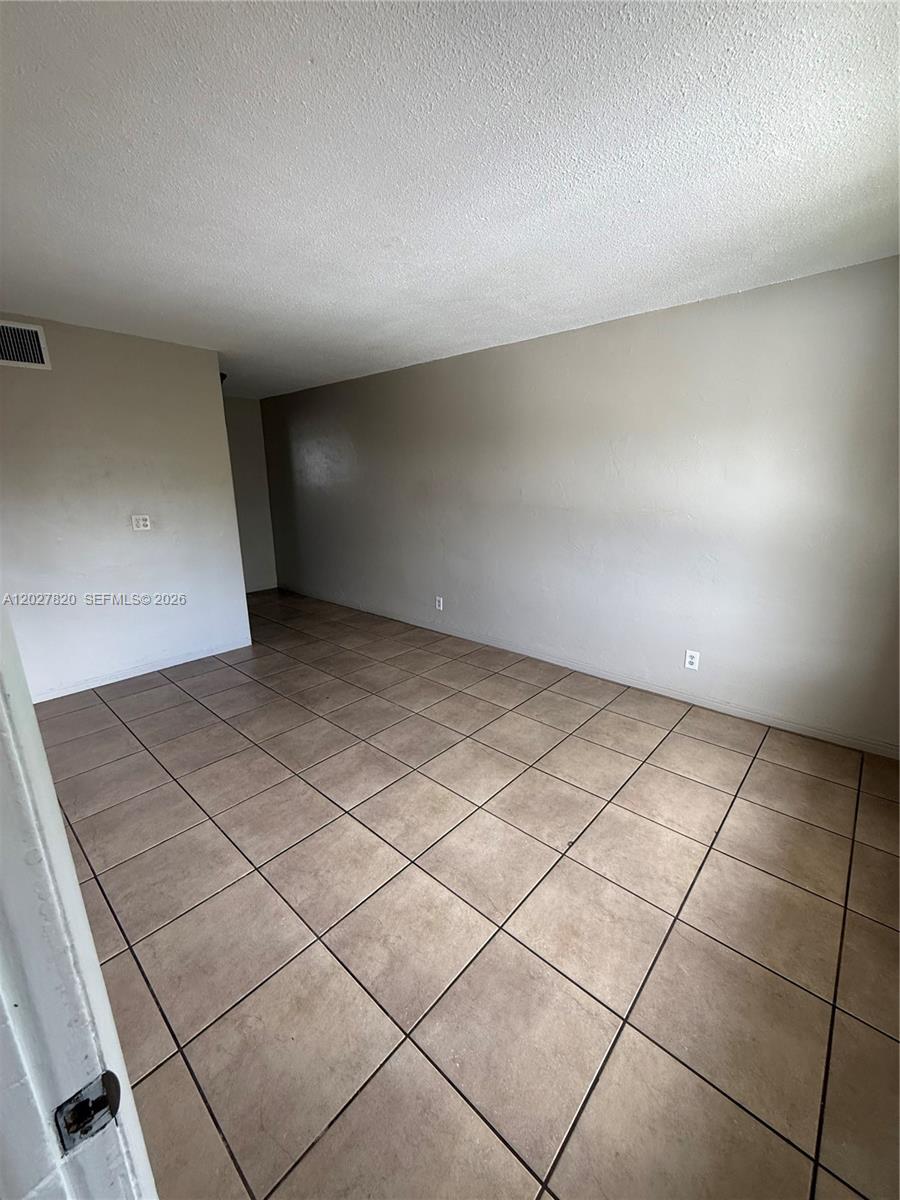 6841 Pembroke Road, Unit 15 Pembroke Pines, FL 33023 - Photo 5 of 16 a view of an empty room