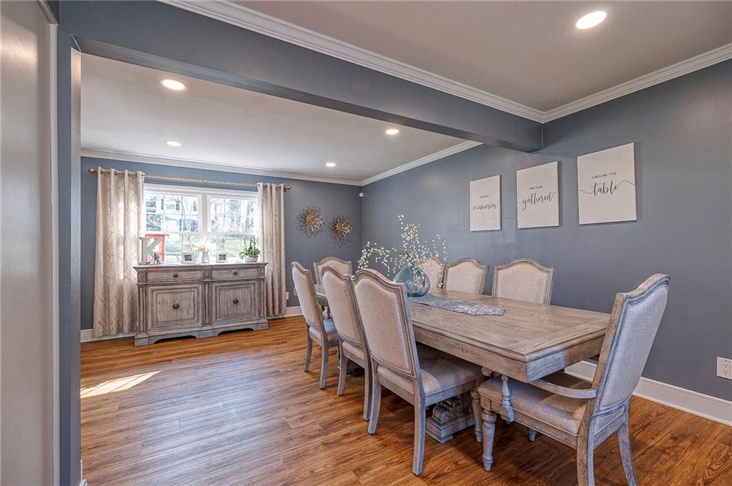 114 Truman Street Monaca, PA 15061 - Photo 13 of 30 a view of a dining room with furniture and wooden floor