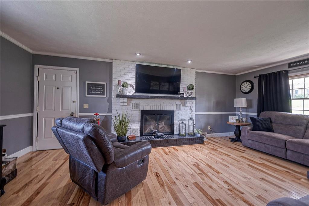 114 Truman Street Monaca, PA 15061 - Photo 17 of 30 a living room with furniture and a fireplace