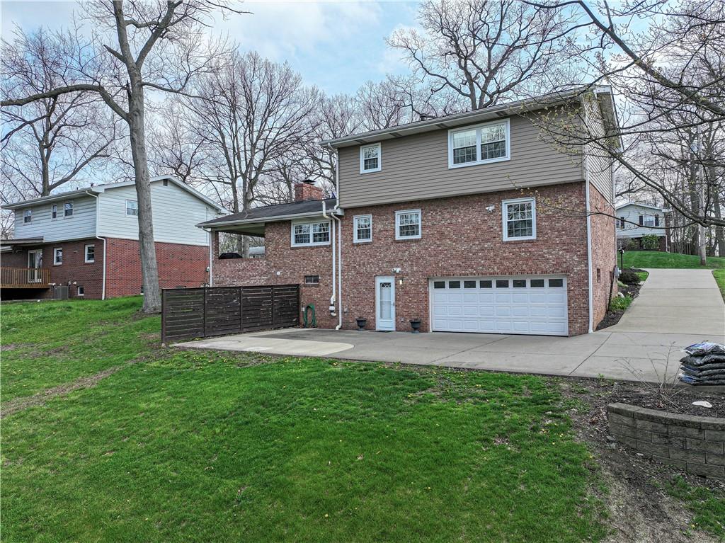 114 Truman Street Monaca, PA 15061 - Photo 2 of 30 a view of a house with a yard and a large tree