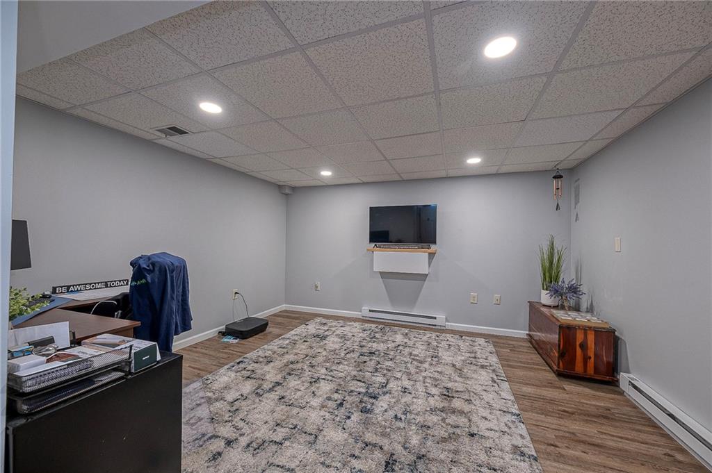 114 Truman Street Monaca, PA 15061 - Photo 21 of 30 a room with furniture and a flat screen tv