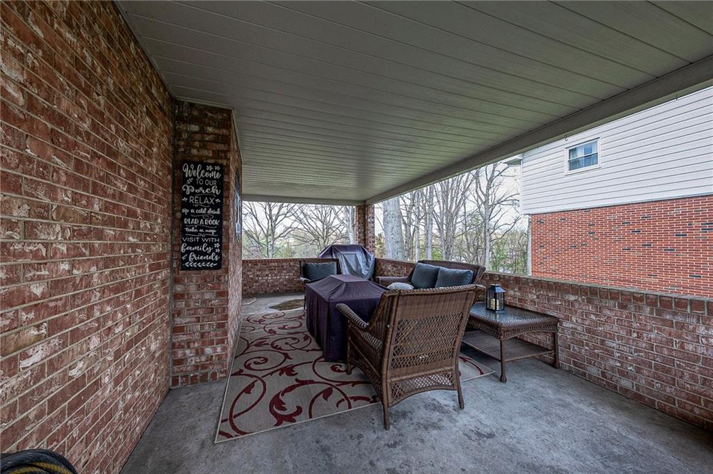 114 Truman Street Monaca, PA 15061 - Photo 28 of 30 a view of a patio with table and chairs and potted plants