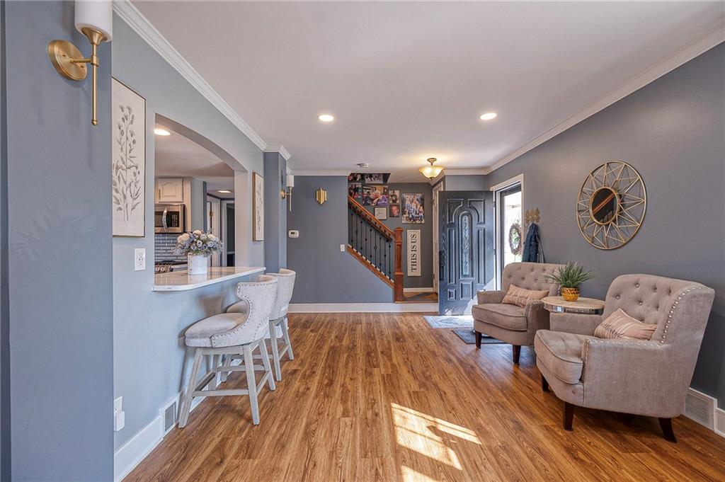 114 Truman Street Monaca, PA 15061 - Photo 10 of 30 a living room with furniture and a wooden floor