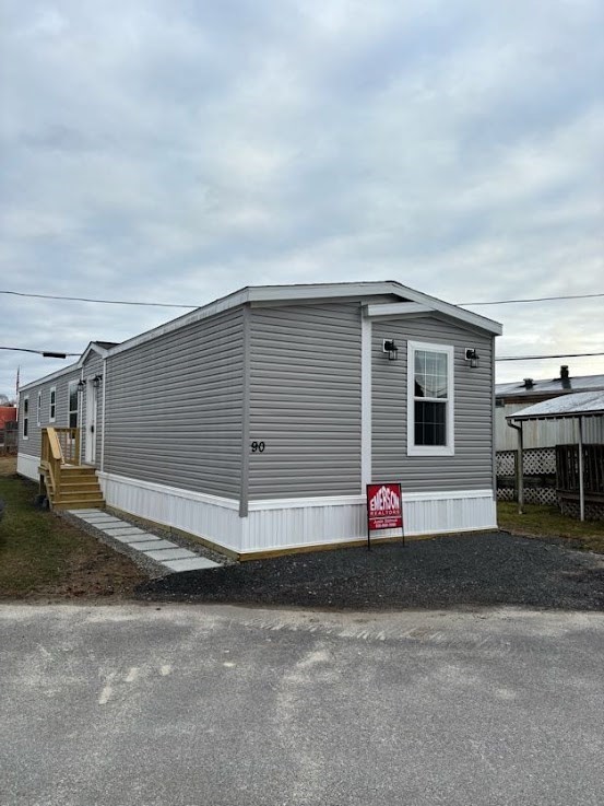 a front view of house with garage