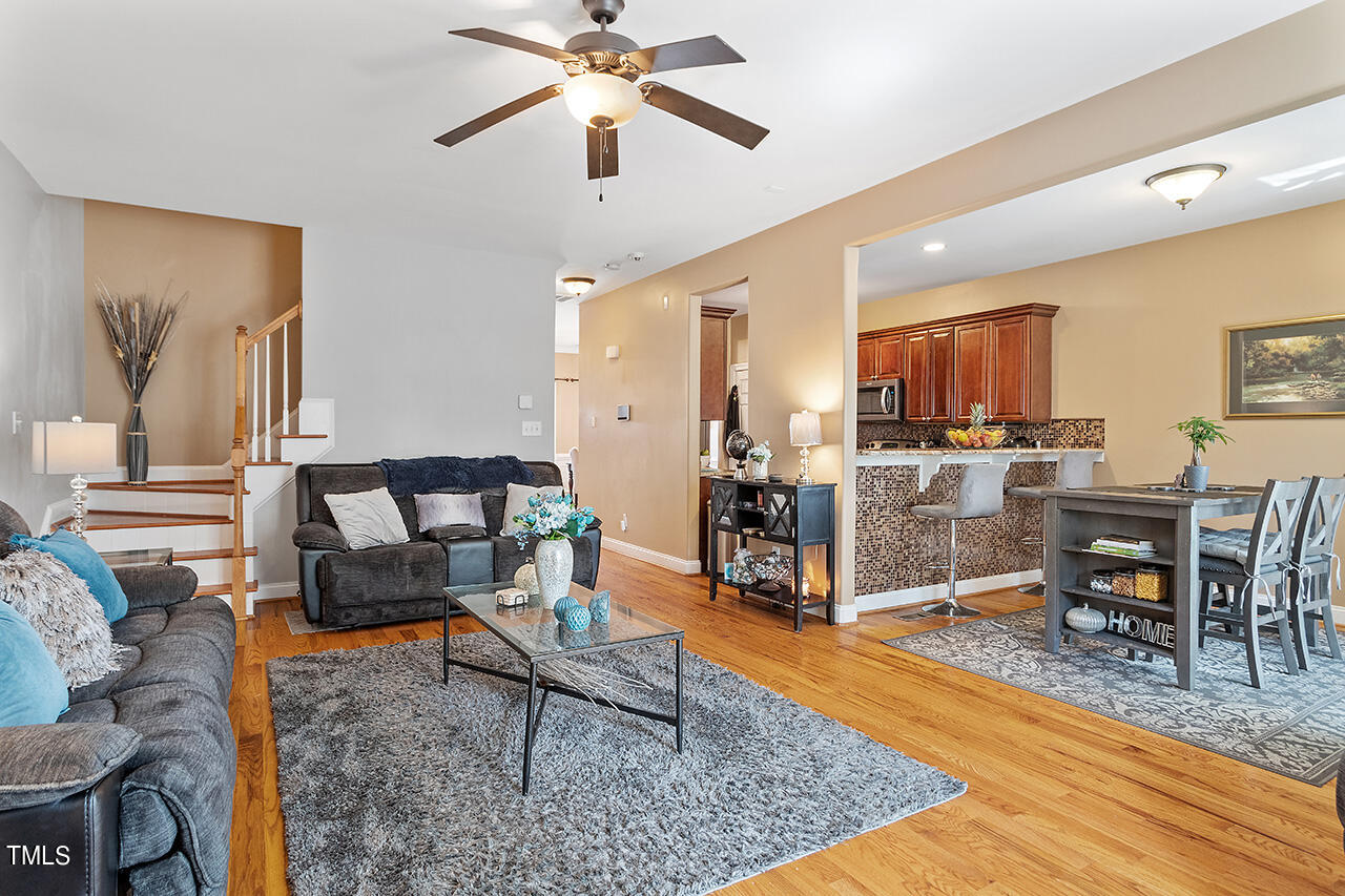 4628 Pat Reed Road Raleigh, NC 27616 - Photo 17 of 34 a living room with furniture and kitchen view