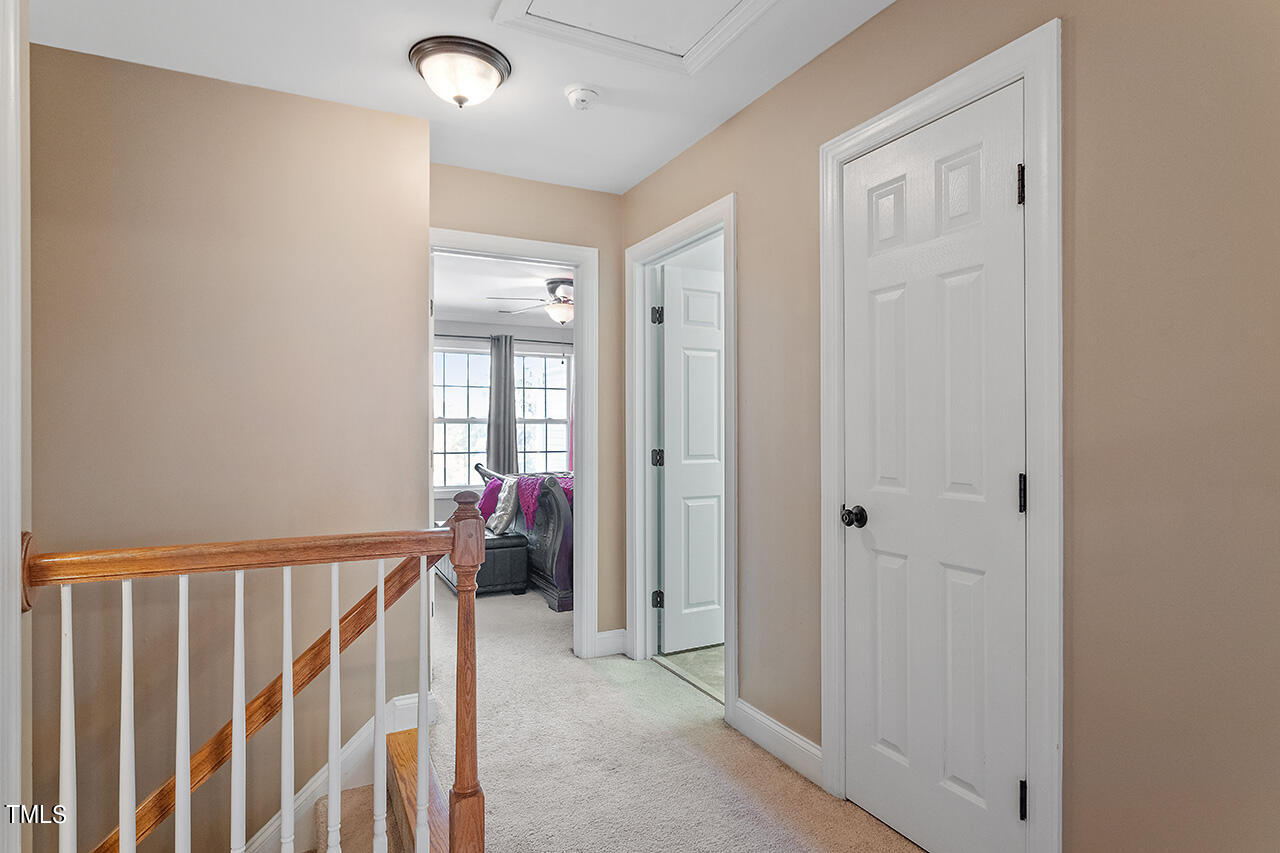 4628 Pat Reed Road Raleigh, NC 27616 - Photo 18 of 34 a view of a hallway and interior of the house