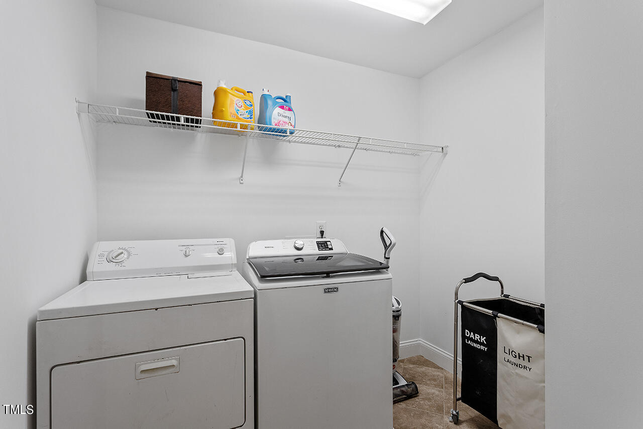 4628 Pat Reed Road Raleigh, NC 27616 - Photo 34 of 34 a utility room with dryer and washer