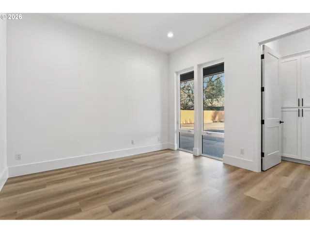 a view of an empty room and window