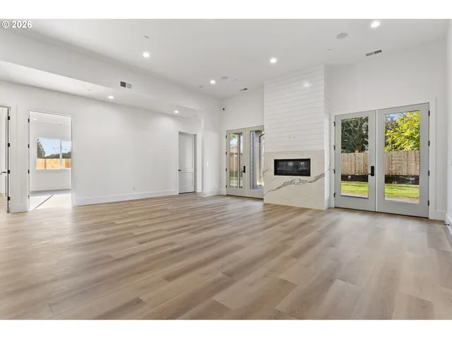 a view of a living room a window and a fireplace