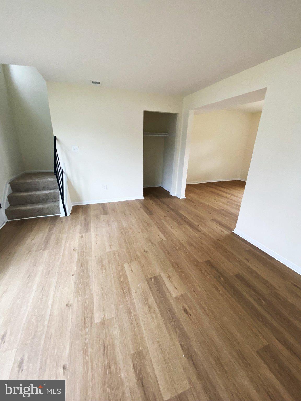 7707 Queens Road Pasadena, MD 21122 - Photo 15 of 19 Spacious, light-filled living area.