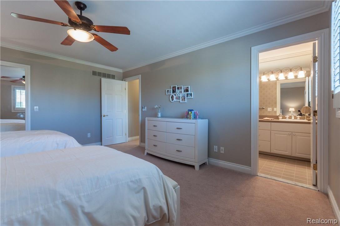 2227 Rochelle Park Drive Rochester, MI 48309 - Photo 12 of 24 Second bedroom. Ceiling fans in both bedrooms.