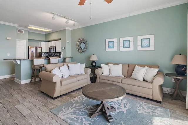 a living room with furniture and a table